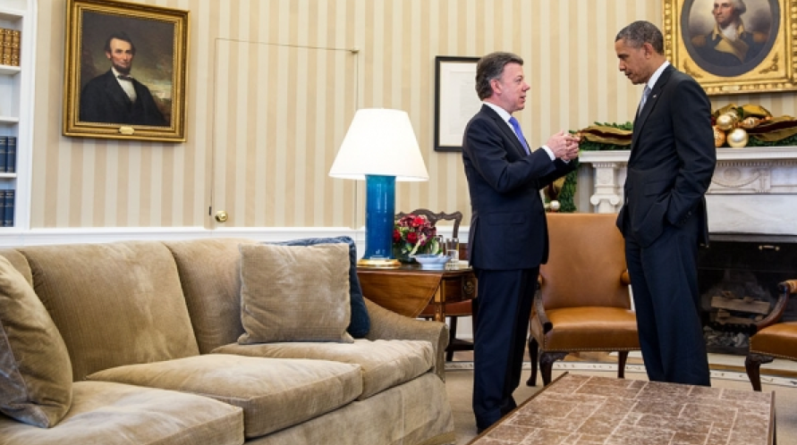 President Barack Obama talks with President Juan Manuel Santos of Colombia after their bilateral meeting in the Oval Office, Dec. 3, 2013. (Official White House Photo by Pete Souza)
